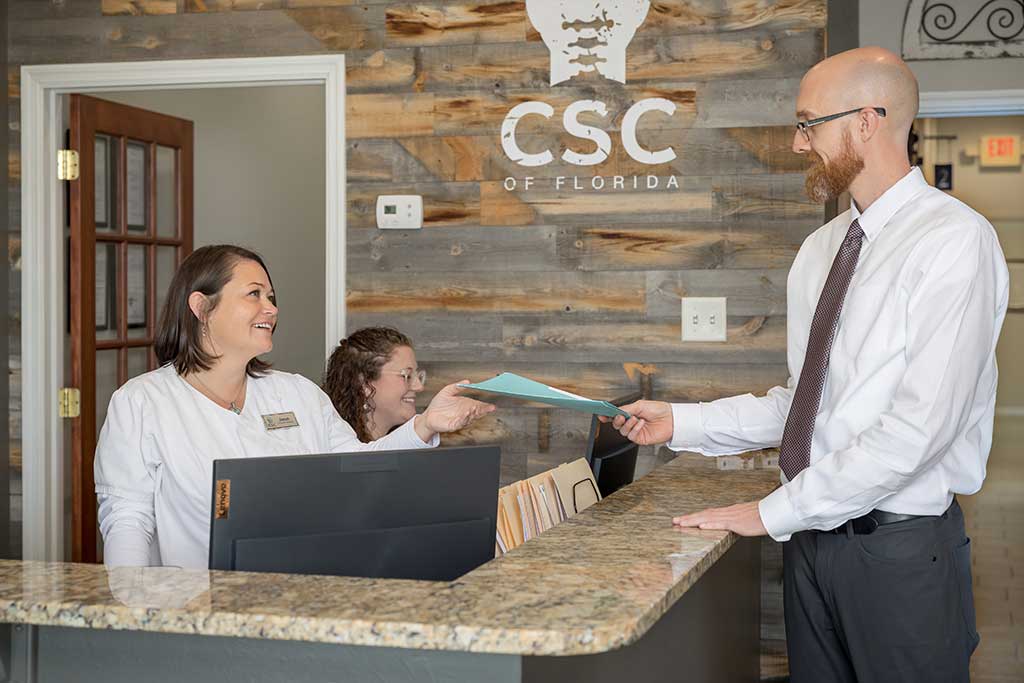 Dr. Chris Erickson and front desk